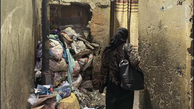 A curtained door flanks a wall scarred with a pile of gunny sacks. (HT Photo) A curtained door flanks a wall scarred with a pile of gunny sacks. (HT Photo)