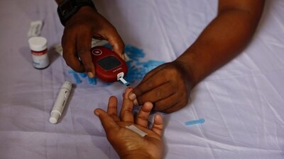 A person receives a free blood sugar test during a campaign to mark the World Diabetes Day in Dhaka, Bangladesh, November 14, 2024. (REUTERS)