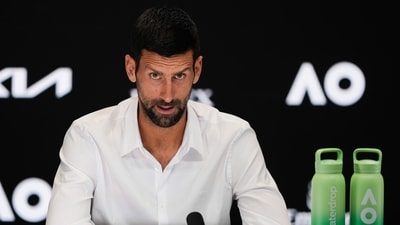 Serbia's Novak Djokovic reacts during a press conference ahead of the Australian Open (AP) Serbia's Novak Djokovic reacts during a press conference ahead of the Australian Open (AP)
