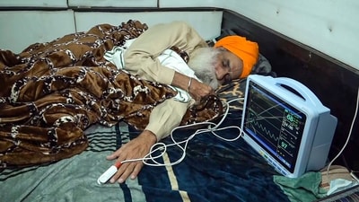 Farmer leader Jagjit Singh Dallewal rests during his hunger strike, at the Khanauri Border in Sangrur district. (File image) (PTI) Farmer leader Jagjit Singh Dallewal rests during his hunger strike, at the Khanauri Border in Sangrur district. (File image) (PTI)