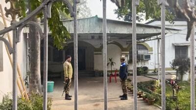 Security personnel stand guard during a raid by the Enforcement Directorate at premises linked to RJD MLA and former Bihar minister Alok Kumar Mehta. (PTI) Security personnel stand guard during a raid by the Enforcement Directorate at premises linked to RJD MLA and former Bihar minister Alok Kumar Mehta. (PTI)