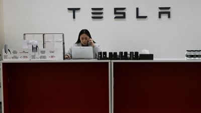 With the hope that a revamped look and improved inside will help it recapture market share lost to competitors like Xiaomi, Tesla unveiled a new version of its best-selling vehicle, the Model Y, in China on Friday. (REUTERS/Florence Lo)