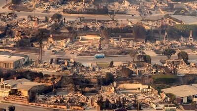 In this aerial view taken from a helicopter, burned homes are seen from above during the Palisades fire near the Pacific Palisades neighborhood of Los Angeles, California on January 9, 2025. (Josh Edelson/AFP) In this aerial view taken from a helicopter, burned homes are seen from above during the Palisades fire near the Pacific Palisades neighborhood of Los Angeles, California on January 9, 2025. (Josh Edelson/AFP)