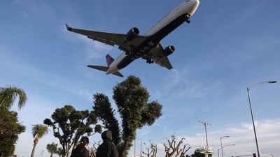 A stowaway was caught on Delta Airlines flight bound for Hawaii from Seattle on Christmas Eve (Getty Images via AFP) A stowaway was caught on Delta Airlines flight bound for Hawaii from Seattle on Christmas Eve (Getty Images via AFP)
