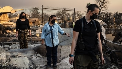 Residents sift through the remains of their charred home after it was destroyed in the Eaton Fire in Altadena, California. The death toll from the wildfires rose to 10, up from seven, according to an update from Los Angeles County's Medical Examiner late Thursday. (AFP) Residents sift through the remains of their charred home after it was destroyed in the Eaton Fire in Altadena, California. The death toll from the wildfires rose to 10, up from seven, according to an update from Los Angeles County's Medical Examiner late Thursday. (AFP)