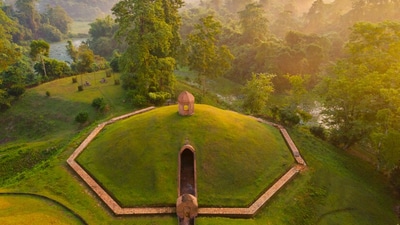 The Charaideo Moidams, a 700-year-old burial mound system from Assam's Ahom dynasty is on UNESCO's World Heritage List. They are also called the ‘Pyramids of Assam.' (PC: Directorate of Archaeology, Government of Assam) The Charaideo Moidams, a 700-year-old burial mound system from Assam's Ahom dynasty is on UNESCO's World Heritage List. They are also called the ‘Pyramids of Assam.' (PC: Directorate of Archaeology, Government of Assam)