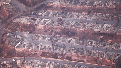 In an aerial view, destroyed homes are seen as the Palisades Fire continues to burn on January 09, 2025 in Pacific Palisades, California. (Getty Images via AFP)