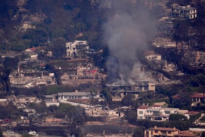 The devastation from the Palisades Fire is seen from the air in the Pacific Palisades neighborhood of Los Angeles, Thursday, Jan. 9, 2025. (AP) The devastation from the Palisades Fire is seen from the air in the Pacific Palisades neighborhood of Los Angeles, Thursday, Jan. 9, 2025. (AP)