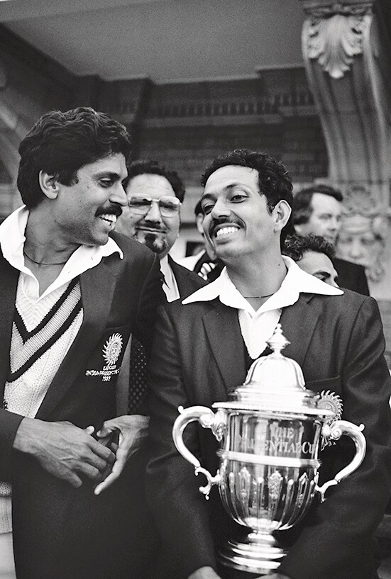 With Kapil Dev, just after the ’83 win. (Getty Images) With Kapil Dev, just after the ’83 win. (Getty Images)