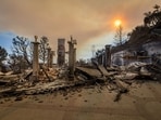 The columns of a mansion stand amongst the ruins of a home following the Palisades Fire in the Pacific Palisades area of Los Angeles, California, US, on Friday. The columns of a mansion stand amongst the ruins of a home following the Palisades Fire in the Pacific Palisades area of Los Angeles, California, US, on Friday.