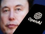 FILE PHOTO: OpenAI logo is seen in front of Elon Musk photo.