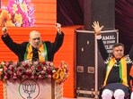 Union home minister Amit Shah addresses at the 'Jhuggi Basti Pradhan Sammelan', in New Delhi. Union home minister Amit Shah addresses at the 'Jhuggi Basti Pradhan Sammelan', in New Delhi.