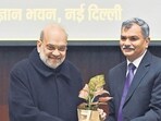 Union home minister Amit Shah being presented with a plant by Director General of the Narcotics Control Bureau (NCB) Anurag Garg during the Regional Conference on "Drug Trafficking and National Security", at Vigyan Bhawan in New Delhi on Saturday. (ANI) Union home minister Amit Shah being presented with a plant by Director General of the Narcotics Control Bureau (NCB) Anurag Garg during the Regional Conference on "Drug Trafficking and National Security", at Vigyan Bhawan in New Delhi on Saturday. (ANI)