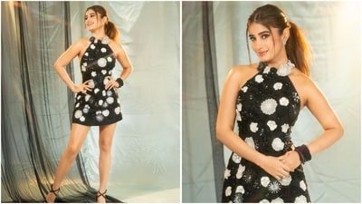 Rasha channeled pure glamour in a black halter neck mini dress, studded with shimmering white flowers all over, creating a stunning look. (Instagram)
