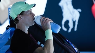 Italy's Jannik Sinner takes a drink during a practice session ahead of the Australian Open tennis championship in Melbourne, Australia, Saturday, Jan. 11, 2025 (AP) Italy's Jannik Sinner takes a drink during a practice session ahead of the Australian Open tennis championship in Melbourne, Australia, Saturday, Jan. 11, 2025 (AP)