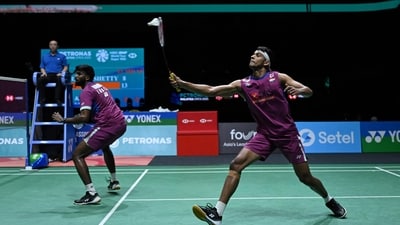 India's Chirag Shetty (R) hits a return next to Satwiksairaj Rankireddy (L) against South Korea's Kim Won-ho and Seo Seung-jae during their men's doubles semi-final (AFP) India's Chirag Shetty (R) hits a return next to Satwiksairaj Rankireddy (L) against South Korea's Kim Won-ho and Seo Seung-jae during their men's doubles semi-final (AFP)