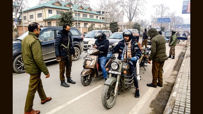 Security personnel check vehicles in Ganderbal district on Saturday. (PTI) Security personnel check vehicles in Ganderbal district on Saturday. (PTI)
