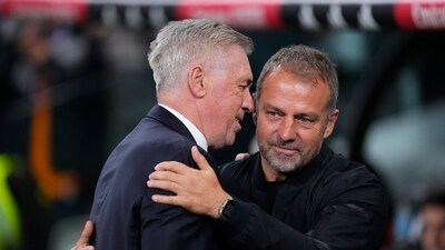 Real Madrid's head coach Carlo Ancelotti, left, hugs Barcelona's head coach Hansi Flick. (AP) Real Madrid's head coach Carlo Ancelotti, left, hugs Barcelona's head coach Hansi Flick. (AP)