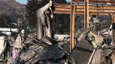 Pacific Palisades Fire: A congregant looks through the remains of Community United Methodist Church, which was destroyed by the Palisades Fire, as wildfires cause damage and loss through Los Angeles County on January 10, 2025 in Pacific Palisades, California.&nbsp; (Mario Tama/Getty Images/AFP)