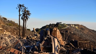A house destroyed by the Palisades fire sits atop of a mountain near Saddle Peak, in the Santa Monica Mountains between Malibu and Calabasas, California on January 10, 2025. (AFP) A house destroyed by the Palisades fire sits atop of a mountain near Saddle Peak, in the Santa Monica Mountains between Malibu and Calabasas, California on January 10, 2025. (AFP)