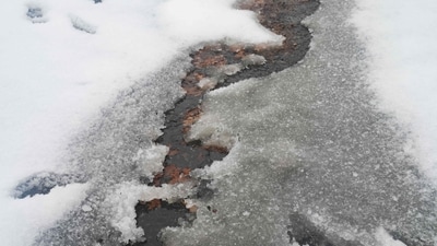 12. Water runs down a gutter as snow melts following a snowstorm on January 10, 2025 in Atlanta, Georgia. (Getty Images via AFP) 12. Water runs down a gutter as snow melts following a snowstorm on January 10, 2025 in Atlanta, Georgia. (Getty Images via AFP)