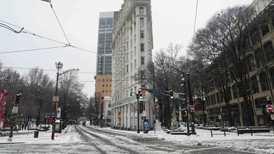Snow covers parts of Atlanta following a snowstorm on January 10, 2025 in Atlanta, Georgia. Atlanta has experienced a significant amount of snow but is bracing for the ice that is expected to follow. (Getty Images via AFP) Snow covers parts of Atlanta following a snowstorm on January 10, 2025 in Atlanta, Georgia. Atlanta has experienced a significant amount of snow but is bracing for the ice that is expected to follow. (Getty Images via AFP)