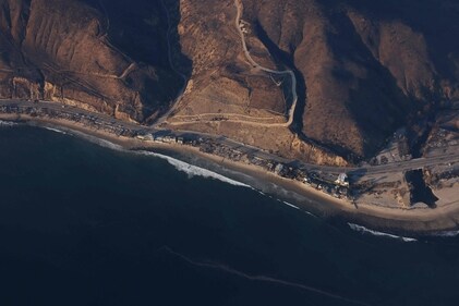 This aerial photo shows homes and businesses reduced to rubble by the Palisades Fire along the Pacific Coast Highway in the Pacific Palisades neighborhood of Los Angeles, California, on January 10, 2025. (AFP) This aerial photo shows homes and businesses reduced to rubble by the Palisades Fire along the Pacific Coast Highway in the Pacific Palisades neighborhood of Los Angeles, California, on January 10, 2025. (AFP)