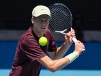Italy's Jannik Sinner plays a backhand return during a practice session. Italy's Jannik Sinner plays a backhand return during a practice session.