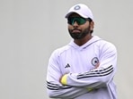 India's Rohit Sharma watches teammates during a practice session India's Rohit Sharma watches teammates during a practice session