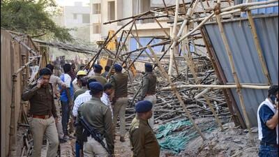 Eight workers trapped under debris consisting of iron bars and construction material were evacuated and admitted to different hospitals (PTI) Eight workers trapped under debris consisting of iron bars and construction material were evacuated and admitted to different hospitals (PTI)