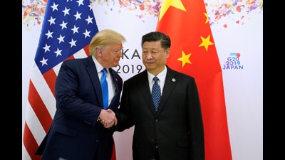 FILE PHOTO: U.S. President Donald Trump and China's President Xi Jinping shake hands ahead of their bilateral meeting during the G20 leaders summit in Osaka, Japan, June 29, 2019. REUTERS/Kevin Lamarque/File Photo (REUTERS) FILE PHOTO: U.S. President Donald Trump and China's President Xi Jinping shake hands ahead of their bilateral meeting during the G20 leaders summit in Osaka, Japan, June 29, 2019. REUTERS/Kevin Lamarque/File Photo (REUTERS)