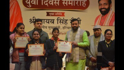 Haryana chief minister Nayab Singh Saini giving job offer letters to ITI trainees during the state-level “Yuva Diwas” function in Panchkula on Sunday. (Sant Arora/HT) Haryana chief minister Nayab Singh Saini giving job offer letters to ITI trainees during the state-level “Yuva Diwas” function in Panchkula on Sunday. (Sant Arora/HT)