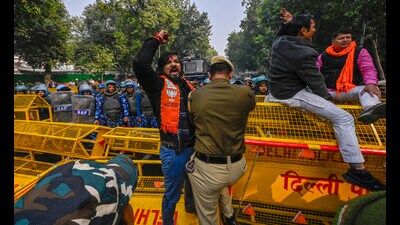 New Delhi, India - Jan. 10, 2025: Delhi BJP activists being detained during a protest against AAP for allegedly making "fake" claims regarding registration of voters from Uttar Pradesh and Bihar in the electoral rolls ahead of Delhi Assembly polls, near AAP Convenor Arvind Kejriwal temporary residence in New Delhi, India, on Friday, January 10, 2025. (Photo by RAJ K RAJ / Hindustan Times) (RAJ K RAJ /HT PHOTO) New Delhi, India - Jan. 10, 2025: Delhi BJP activists being detained during a protest against AAP for allegedly making "fake" claims regarding registration of voters from Uttar Pradesh and Bihar in the electoral rolls ahead of Delhi Assembly polls, near AAP Convenor Arvind Kejriwal temporary residence in New Delhi, India, on Friday, January 10, 2025. (Photo by RAJ K RAJ / Hindustan Times) (RAJ K RAJ /HT PHOTO)