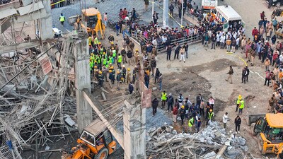 Rescue operation underway after an under-construction building collapsed at the Kannauj railway station, trapping around two dozen workers under the rubble, in Kannauj on Sunday. (PTI) Rescue operation underway after an under-construction building collapsed at the Kannauj railway station, trapping around two dozen workers under the rubble, in Kannauj on Sunday. (PTI)