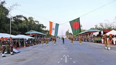 Security personnel of India and Bangladesh during a Joint Retreat Ceremony, at Land and Customs Station Fulbari on the outskirts of Siliguri on January 12, 2025. (PTI) Security personnel of India and Bangladesh during a Joint Retreat Ceremony, at Land and Customs Station Fulbari on the outskirts of Siliguri on January 12, 2025. (PTI)