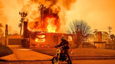 A burning home during the Eaton fire in the Altadena area of Los Angeles county, California on January 8. (AFP)