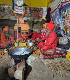 'Rabri Baba' also known as Mahant Devgiri makes rabri, which he serves to devotees at Maha Kumbh, in Prayagraj on Friday. (ANI ) 'Rabri Baba' also known as Mahant Devgiri makes rabri, which he serves to devotees at Maha Kumbh, in Prayagraj on Friday. (ANI )