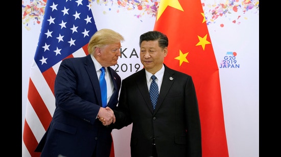 FILE PHOTO: U.S. President Donald Trump and China's President Xi Jinping shake hands ahead of their bilateral meeting during the G20 leaders summit in Osaka, Japan, June 29, 2019. REUTERS/Kevin Lamarque/File Photo (REUTERS)