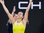 Aryna Sabalenka of Belarus celebrates victory with on-court presenter Jelena Dokic. Aryna Sabalenka of Belarus celebrates victory with on-court presenter Jelena Dokic.