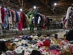 People affected by the Los Angeles fires visit relief center looking for needed supplies on January 12. (AFP) People affected by the Los Angeles fires visit relief center looking for needed supplies on January 12. (AFP)