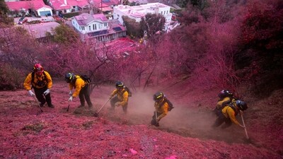 Crews from California and nine other states are part of the ongoing response that includes nearly 1,400 fire engines, 84 aircraft and more than 14,000 personnel, including newly arrived firefighters from Mexico. (REUTERS)