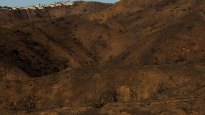 Over 1,53,000 residents and 57,000 structures are under evacuation orders, and another 1,66,000 residents have been warned of potential evacuation. (REUTERS)
