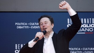 Tesla and SpaceX's CEO Elon Musk gestures, as he attends political festival Atreju organised by Italian Prime Minister Giorgia Meloni's Brothers of Italy (Fratelli d'Italia) right-wing party, in Rome, Italy, December 16, 2023 (Guglielmo Mangiapane/Reuters)