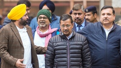 AAP chief Arvind Kejriwal, Punjab CM Bhagwat Mann, AAP MP Sanjay Singh and leader Awadh Ojha leave the Election Commission office. (PTI) AAP chief Arvind Kejriwal, Punjab CM Bhagwat Mann, AAP MP Sanjay Singh and leader Awadh Ojha leave the Election Commission office. (PTI)