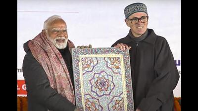 Prime Minister Narendra Modi with Jammu and Kashmir chief minister Omar Abdullah during a public meeting at Sonamarg in Ganderbal district on Monday. (PTI Photo) Prime Minister Narendra Modi with Jammu and Kashmir chief minister Omar Abdullah during a public meeting at Sonamarg in Ganderbal district on Monday. (PTI Photo)