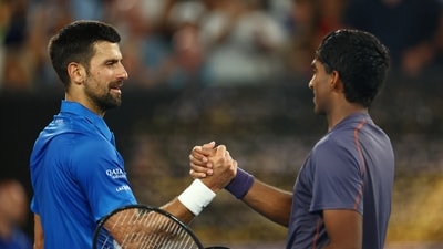 Novak Djokovic vs Nishesh Basavareddy Australian Open 2025: Serbia's Novak Djokovic shakes hands with Nishesh Basavareddy of the United States after winning his first round match. (REUTERS)