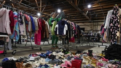 People affected by the Los Angeles fires visit relief center looking for needed supplies on January 12. (AFP) People affected by the Los Angeles fires visit relief center looking for needed supplies on January 12. (AFP)