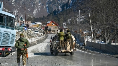 Security personnel stand guard near the Z-Morh tunnel project site, in J&K. The tunnel is scheduled to be inaugurated by Prime Minister Narendra Modi on Monday. (PTI) Security personnel stand guard near the Z-Morh tunnel project site, in J&K. The tunnel is scheduled to be inaugurated by Prime Minister Narendra Modi on Monday. (PTI)