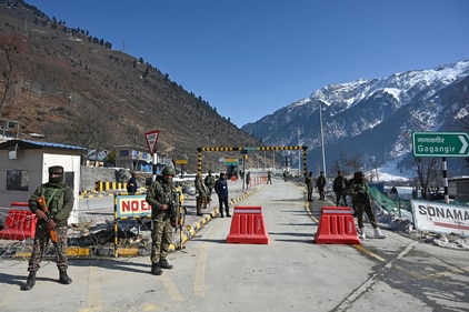 Paramilitary soldiers stand guard near Z-Morh Tunnel at Gagangeer some 82 kilometers from Srinagar on January 12, 2025. (Waseem Andrabi /Hindustan Times)