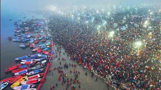 Devotees take the holy dip at Mahakumbh 2025. (HT Photo)